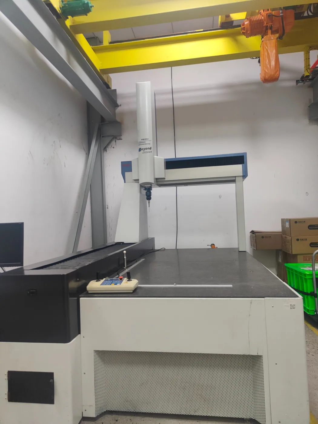 Coordinate measuring machine in the inspection area